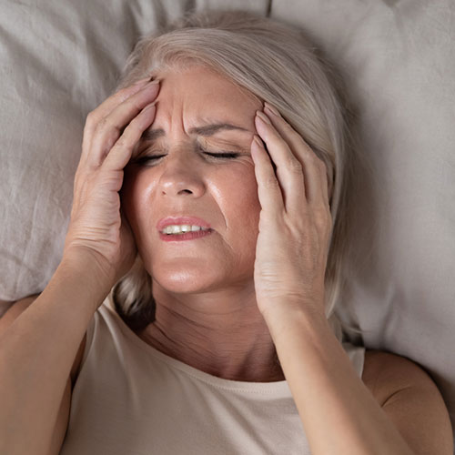 Women suffering from headache