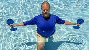 Chest Fly exercise in Swimming Pool for Seniors.