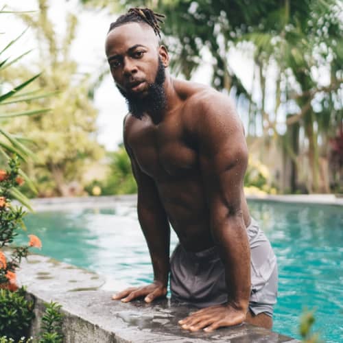 Man showing how to do Standing Push ups in Swimming Pool