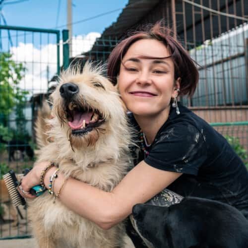 Women adopting dog