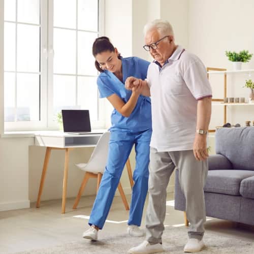 Nurse taking care of an old man 