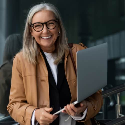 Senior lady wearing an elegant dress to office