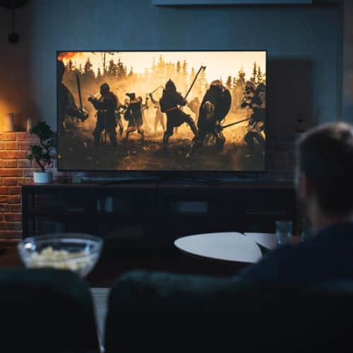 Senior watching a movie 