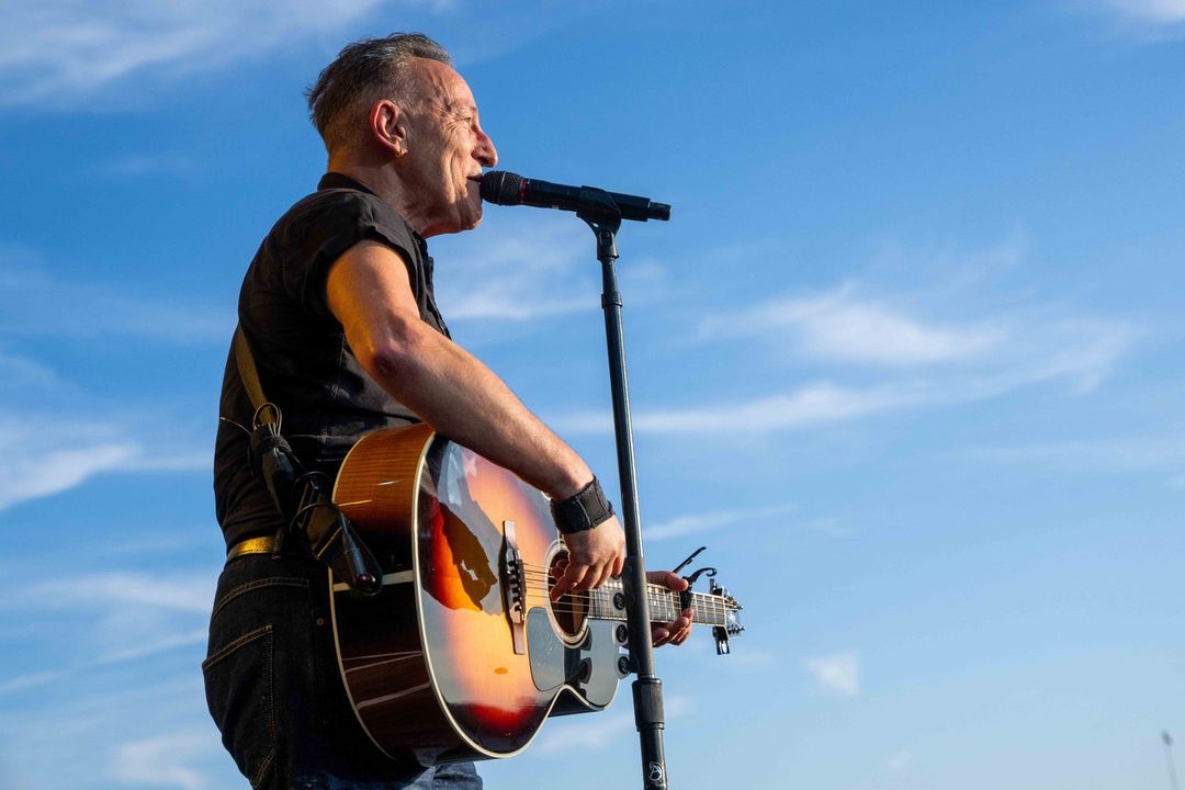 Bruce Springsteen performing with his Guita