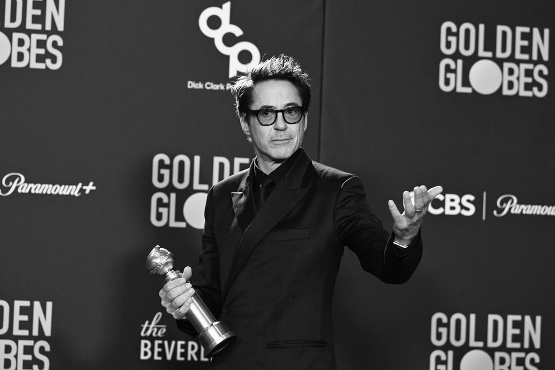 Robert Downey Jr. with Golden globes award in hand