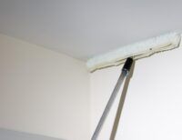 How to Clean High Ceilings and Corners Safely Without Ladders
